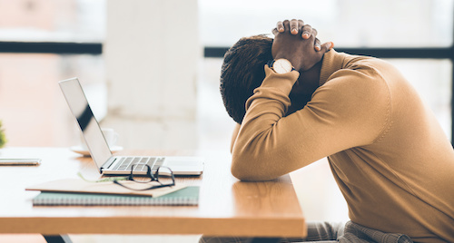 employee suffering from work related burnout